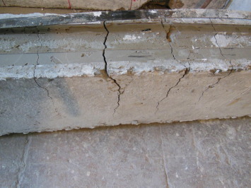 Cracking pattern and debonding of CFRP strips at failure for beam B-S-2.