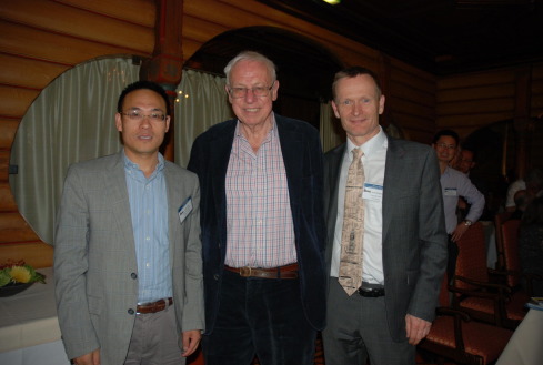 Yun-Gui Yang (left) and Arne Klungland (right) with Tomas Lindahl at the “Tomas ...