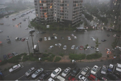 Flooding in Beijing on July 21, 2012 caused deaths and serious economic losses. ...