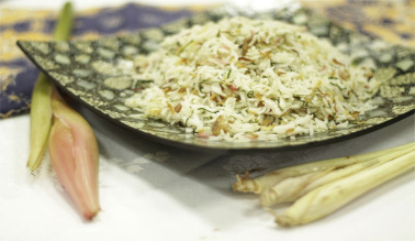Nasi ulam Nyonya (herbal rice). Nasi ulam Nyonya is a steamed rice cooked with ...