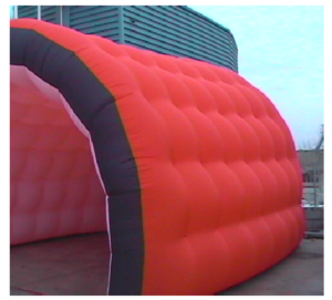 Cylindrical pavilion formed by a double layer membrane with tension ropes