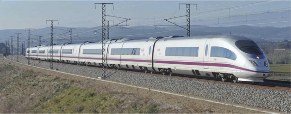 High-speed train travelling over a ballasted railway track.