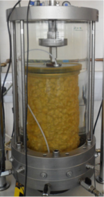 Triaxial test device with ballast  inside. Source: Harkness et al. [48].